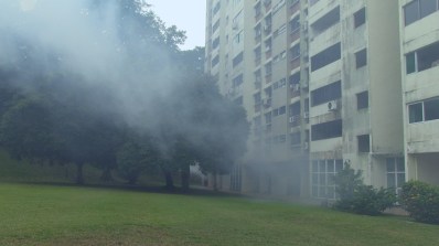 IN_TIME_TO_COME_3_Caption_routine_mosquito_fogging_casts_housing_estate_in_fog-Still020